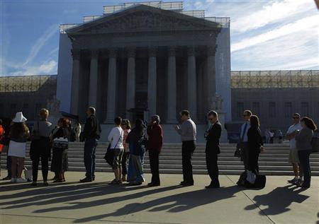 People line up for admission at the U.S. Supreme Court in Washington October 1, 2012. REUTERS/Gary Cameron