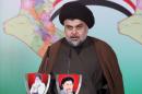 Prominent Iraqi Shi'ite cleric Moqtada al-Sadr delivers a statement in Najaf