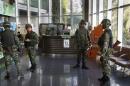 Thai soldiers occupy the foyer of the National Broadcasting Services of Thailand television station in Bangkok