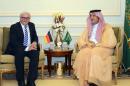 In this photo released by Saudi Press Agency, German Foreign Minister Frank-Walter Steinmeier, left, meets with Saudi Arabia's Foreign Minister Saud al-Faisal in Jeddah, Saudi Arabia, Monday, Oct. 13, 2014. During a joint press conference, al-Faisal lashed out at regional rival Iran, accusing the Shiite powerhouse of having forces inside Syria, Iraq and Yemen, and insisting that Iran is 