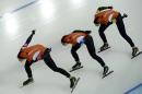 Speedskaters from the Netherlands, left to right, Jorien ter Mors, Ireen Wust, and Lotte van Beek compete in the women's speedskating team pursuit quarterfinals at the Adler Arena Skating Center at the 2014 Winter Olympics, Friday, Feb. 21, 2014, in Sochi, Russia. (AP Photo/Antonin Thuillier, Pool)