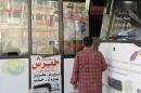 Bus driver Abu Ali walks past prepares to travel into Syria from the Charles Helou bus station in Beirut