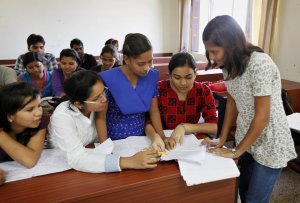 Sushma Verma, 13, right, interacts with seniors in …