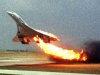 FILE - In this July 25, 2000, file photo, Air France Concorde flight 4590 takes off with fire trailing from its engine on the left wing from Charles de Gaulle airport in Paris. A French appeals court is expected to decide on Thursday, Nov. 29, 2012, whether to uphold a manslaughter conviction against Continental Airlines for the crash over a decade ago of an Air France Concorde that killed 113 people. Continental Airlines, Inc. and one of its mechanics were convicted in 2010. (AP Photo/Toshihiko Sato, File) MANDATORY CREDIT; JAPAN OUT