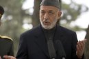 FILE - In this May 25, 2012 file photo, Afghan President Hamid Karzai speaks, in Kabul, Afghanistan. The Obama administration is considering a new gambit to restart peace talks with the Taliban in Afghanistan. The plan to send several Taliban detainees from the military prison at Guantanamo Bay, Cuba, to a prison in Afghanistan, could boost the credibility of Afghan President Hamid Karzai as he and U.S. officials try to draw the Taliban back to peace negotiations. (AP Photo/Anja Niedringhaus, File)