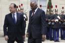French President Hollande welcomes Angola's President dos Santos at the Elysee Palace in Paris