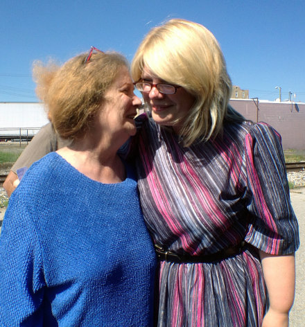 Kristine Bunch, right, hugs her mother Susan Hubbard, after being released in Greensburg, Ind., Wednesday, Aug. 22, 2012, for the first time after16 years in prison. Bunch was convicted of setting a 1995 fire that killed her 3-year-old son, but is free on bail as she awaits a new trial. (AP Photo/The Indianapolis Star, Charlie Nye) NO SALES