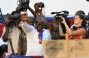 Presidential candidate Akufo-Addo of the opposition New Patriotic Party waves during his last rally in Accra