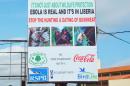 An Ebola information billboard is displayed near the John F Kennedy Memorial Medical Centre in Monrovia, on August 19, 2014