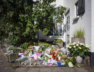 Flowers are laid in front of the house of a family&nbsp;&hellip;