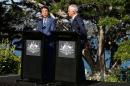 Japanese Prime Minister Shinzo Abe speaks during a media conference as Australian Prime Minister Malcolm Turnbull listens on after their bilateral meeting at Kirribilli House in Sydney, Australia