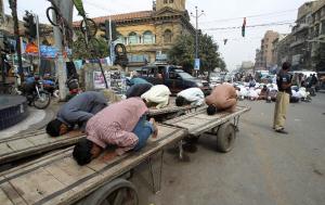 Pakistani worshippers attend a prayer for the victims &hellip;
