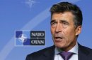 NATO Secretary General Anders Fogh Rasmussen talks to the media during a monthly news conference in Brussels