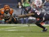 Cincinnati Bengals wide receiver Tate makes a catch in front of Houston Texans cornerback Ball during the third quarter of their NFL AFC wildcard playoff football game in Houston