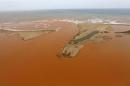An aerial view of the mouth of Rio Doce, which was flooded with mud after a dam owned by Vale SA and BHP Billiton Ltd burst, at an area where the river joins the sea on the coast of Espirito Santo in Regencia Village