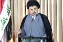 Iraq's Shi'ite religious cleric Moqtada al-Sadr gives a speech in Najaf