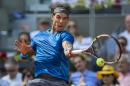 Rafael Nadal from Spain returns the ball during a Madrid Open tennis tournament semifinal match against Roberto Bautista Agut from Spain in Madrid, Spain, Saturday, May 10, 2014. (AP Photo/Andres Kudacki)
