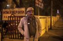 An Indian policeman stands outside the police station which is investigating the gang-rape of a Danish tourist in New Delhi, India, Wednesday, Jan. 15, 2014. A 51-year-old Danish tourist was gang-raped near a popular shopping area in New Delhi after she stopped to ask for directions, police said Wednesday, the latest case to focus attention on the scourge of violence against women in India. The woman managed to reach her hotel in Paharganj area Tuesday evening and the owner called police. (AP Photo/Tsering Topgyal)