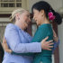Myanmar's pro-democracy opposition leader Aung San Suu Kyi, right, and U.S. Secretary of State Hillary Rodham Clinton embrace while speaking to the press after meetings at Suu Kyi's residence in Yangon, Myanmar Friday, Dec. 2, 2011. (AP Photo/Saul Loeb, Pool)