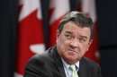 Canada's Finance Minister Flaherty takes part in a news conference in Ottawa
