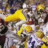 LSU running back Jeremy Hill (33) dives into the end zone for a touchdown against Alabama in the third quarter of an NCAA college football game in Baton Rouge, La., Saturday, Nov. 3, 2012. (AP Photo/Bill Haber)
