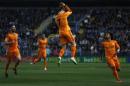 Real Madrid's Ronaldo celebrates after scoring a goal against Malaga during their Spanish First Division soccer match in Malaga