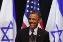 U.S. President Obama smiles while he addresses students at the Jerusalem Convention Center in Jerusalem