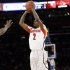 Louisville's Russ Smith (2) shoots during the first half of an NCAA college basketball game against Villanova at the Big East Conference tournament, Thursday, March 14, 2013, in New York. (AP Photo/Frank Franklin II)