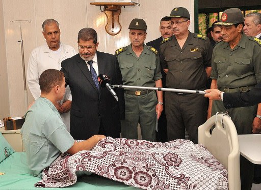 صور/ تغطية أخبارية /جنازة العسكريين المصريين 000-Nic6122024-jpg_062156
