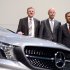 Dieter Zetsche, center, CEO of the motor company Daimler AG, poses together with Andreas Renschler, left, head of utility vehicle and Bodo Uebber, right, chief financial officer at the balance press conference of the company in Stuttgart, Germany, Thursday, Feb. 7, 2013. Daimler said Thursday that fourth quarter net profit was euro 2.3 billion (US dollar 3.1 billion), up from euro 1.79 billion in the same quarter last year, thanks to the sale of 7.5 percent in European defense company EADS. (AP Photo/dpa, Bernd Weissbrod)