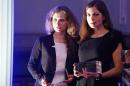 Russian punk band Pussy Riot members Alyokhina and Tolokonnikova pose after winning a trophy in the category "Most Valuable Documentary of the Year" at the "Cinema for Peace" charity gala in Berlin