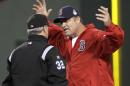 Boston Red Sox manager John Farrell argues a call with umpire Dana DeMuth during the first inning of Game 1 of baseball's World Series against the St. Louis Cardinals Wednesday, Oct. 23, 2013, in Boston. (AP Photo/David J. Phillip)