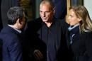 Greek economist Varoufakis is seen outside the Syriza party headquarters in Athens
