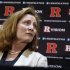 Julie Hermann listens as Rutgers President Robert Barchi announces Hermann as athletic director, Wednesday, May 15, 2013, in Piscataway, N.J. Hermann, who was Louisville's senior associate athletic director, will be the third female athletic director at a school among the 124 playing at college football's top tier. Rutgers has been looking for a new AD since Tim Pernetti resigned on April 5, part of the fallout from the Mike Rice scandal. (AP Photo/Mel Evans)