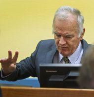 Former Bosnian Serb military commander Gen. Ratko Mladic is seen at the start of his trial at the Yugoslav war crimes tribunal in The Hague, Netherlands, Wednesday May 16, 2012. Twenty years after the opening shots of the Bosnian War, Mladic has gone on trial on charges of genocide, crimes against humanity and war crimes, his appearance at the UN tribunal marks the end of a long wait for justice to survivors of the 1992-95 war that left some 100,000 people dead. (AP Photo/Toussaint Kluiters, Pool)