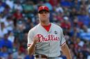 Philadelphia Phillies relief pitcher Jonathan Papelbon reacts after getting the final out against the Chicago Cubs in a baseball game, Friday, July 24, 2015, in Chicago. The Phillies won 5-3 in 10 innings. (AP Photo/David Banks)