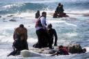 Migrants, who are trying to reach Greece, are rescued by members of the Greek Coast guard and locals near the coast of the southeastern island of Rhodes