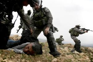 Israeli border police officers detain a Palestinian &hellip;