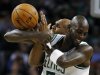 Boston Celtics' Kevin Garnett, right, and Brooklyn Nets' Jerry Stackhouse battle for a loose ball in the second quarter of an NBA basketball game in Boston, Wednesday, Nov. 28, 2012. (AP Photo/Michael Dwyer)