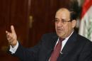 Iraq's Prime Minister al-Maliki speaks during an interview with Reuters in Baghdad