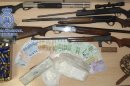 Fotografía facilitada por la Policia Nacional que ha detenido a veintitrés personas en la provincia de Castellón en una amplia operación antidroga que se ha saldado también con la incautación de dos kilos de cocaína y varias armas de fuego. EFE