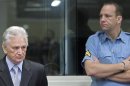 Perisic, the former chief of staff of the Yugoslav army, enters the court room of the Yugoslavia war crimes court in The Hague