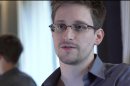 This photo provided by The Guardian Newspaper in London shows Edward Snowden, who worked as a contract employee at the National Security Agency, on Sunday, June 9, 2013, in Hong Kong. The National Security Agency, working with the British government, has secretly been unraveling encryption technology that billions of Internet users rely upon to keep their electronic messages and confidential data safe from prying eyes, according to published reports Thursday, Sept. 5, 2013, based on internal U.S. government documents.(AP Photo/The Guardian, Glenn Greenwald and Laura Poitras)