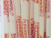 Straws bearing the Dunkin' Donuts logo are seen at a Dunkin' Donuts store in Tewkesbury