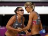 Russia's Anastasia Vasina and Anna Vozakova celebrate a point against China's Zhang Xi and Xue Chen during the women's beach volleyball preliminary match at the Horse Guards Parade during the London 2012 Olympic Games