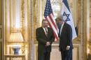 US Secretary of State John Kerry (R) and Israeli Foreign Minister Avigdor Lieberman in Paris on June 26, 2014