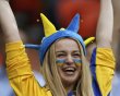Ukrainian soccer fan cheers before the Group D Euro 2012 soccer match against France at Donbass Arena in Donetsk