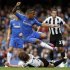 Chelsea's Bertand challenges Newcastle United's Coloccini during their English Premier League soccer match at Stamford Bridge in London