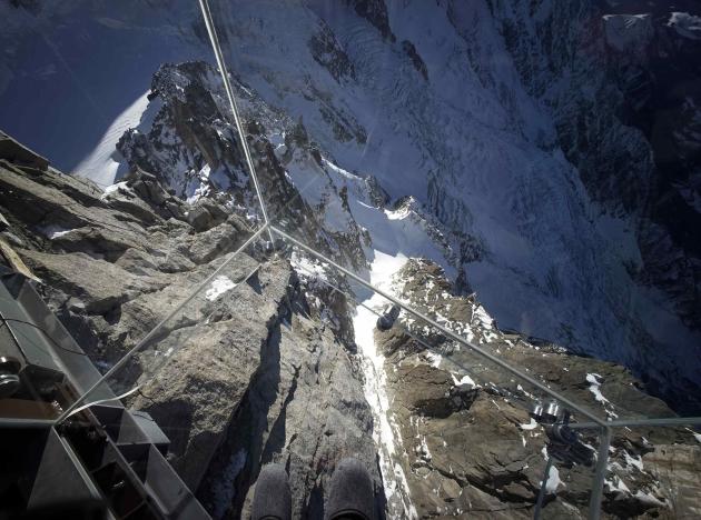 View of the &#39;Step into the Void&#39; installation during a press visit at the Aiguille du Midi mountain peak above Chamonix, in the French Alps,