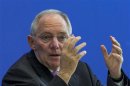 German Finance Minister Schaeuble presents report on proposed benchmark figures for 2014 federal budget in Berlin